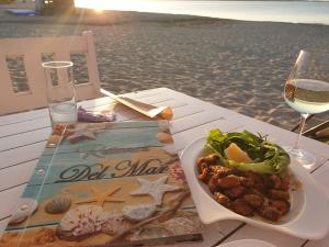 Just next to DEL MAR Beach Restaurant